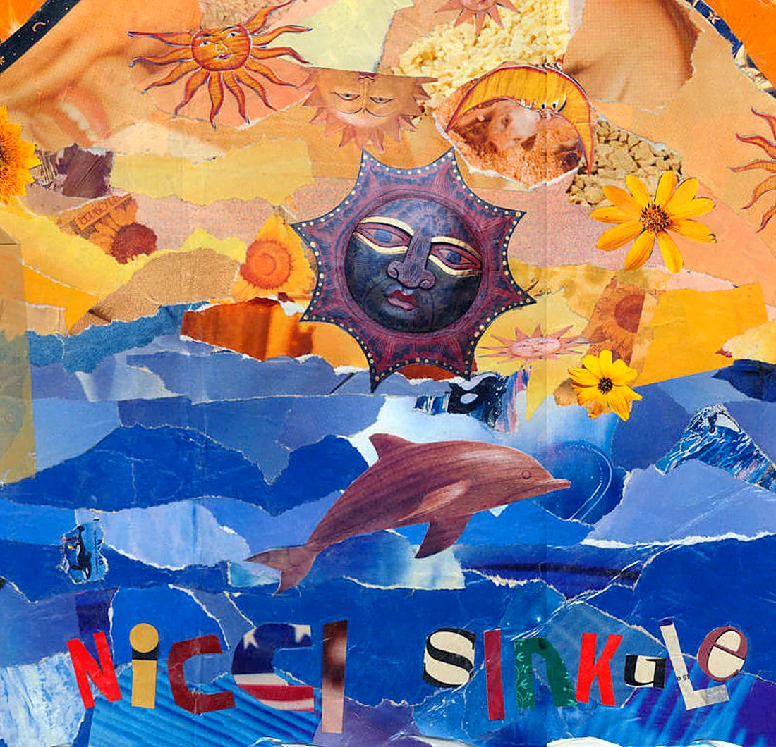 A torn paper collage Nicole made: a sun, a dolphin and the sea, with her name NICCI SINKULE cut from magazine letters along the bottom.